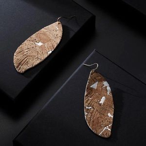boutique Jewelry - Brand new!!!! Cork/faux leather feather earrings boutique Jewelry - Brand new!!!! Cork/faux leather feather earrings
